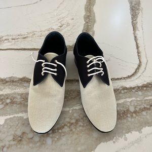 Chanel, navy and cream canvas spectator shoe. Size 41.5.
